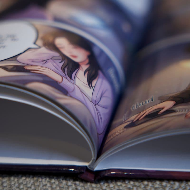 Close-up of printed fiction book pages